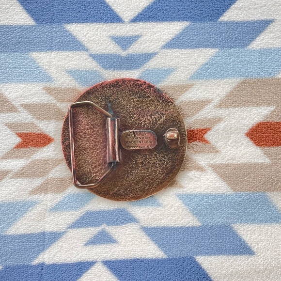 1978 women skier heavy brass buckle, USA made